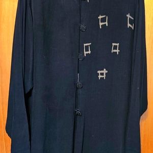 Designer oriental desigm on a long jacket or duster